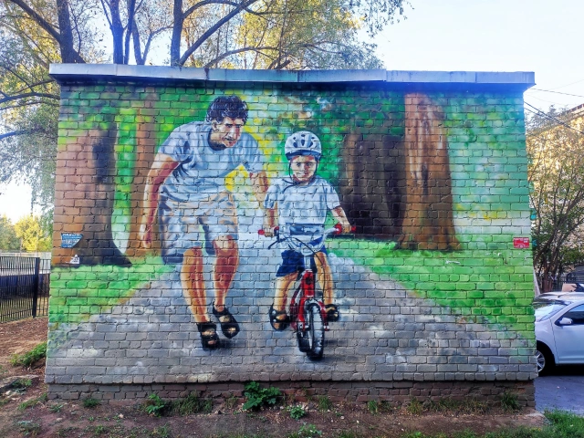 Граффити Мальчик на велосипеде на Кулахметова, 12