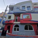 Разноцветный дом Гауди и Хундертвассера на Курашова, 9а 0